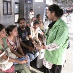 Chintan members explaining to passengers what its work is about. Photo credit: Chintan.