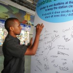 Pledge being signed by a passenger. Photo credit: Chintan.